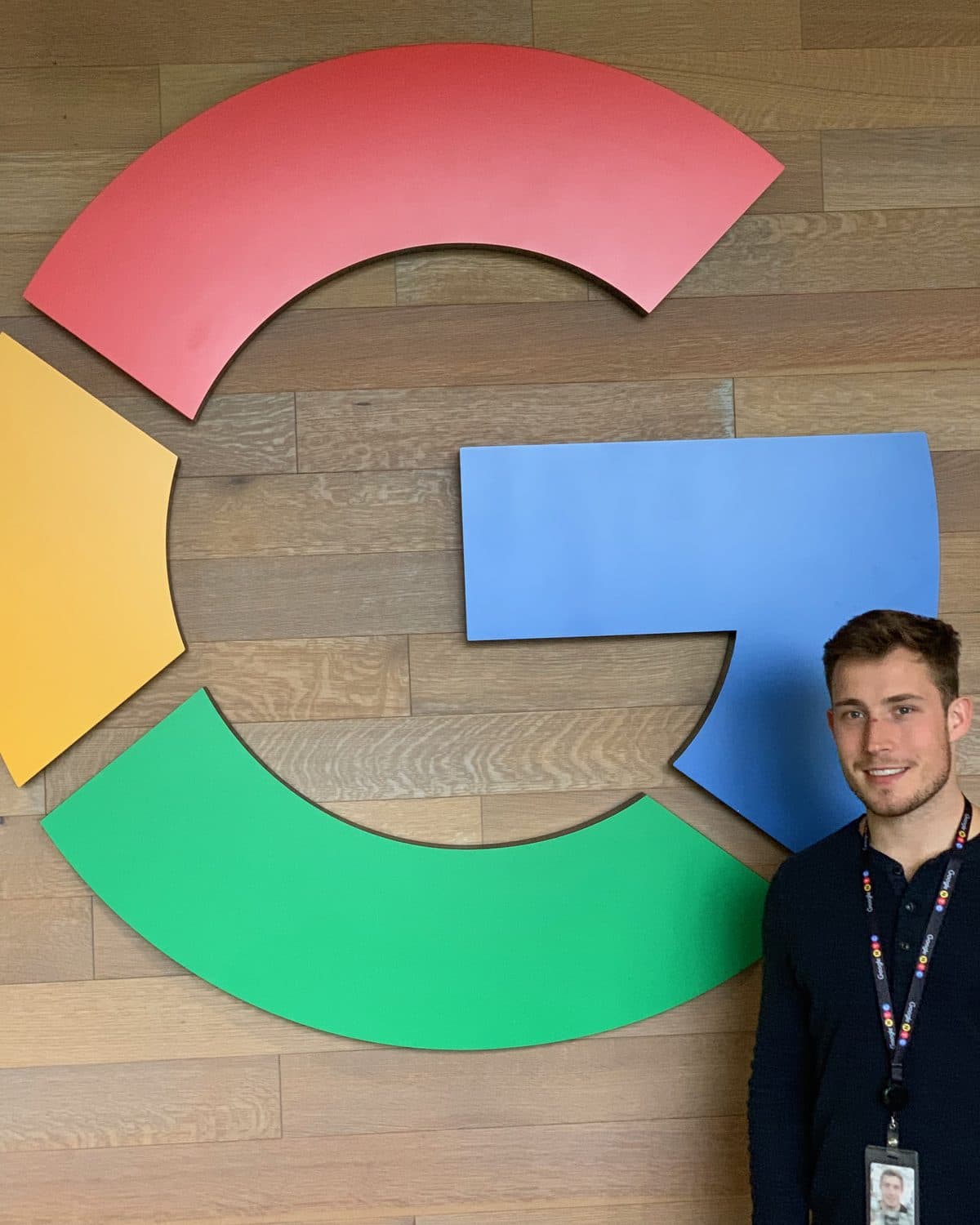 Paul Worrell standing in front of the Google logo